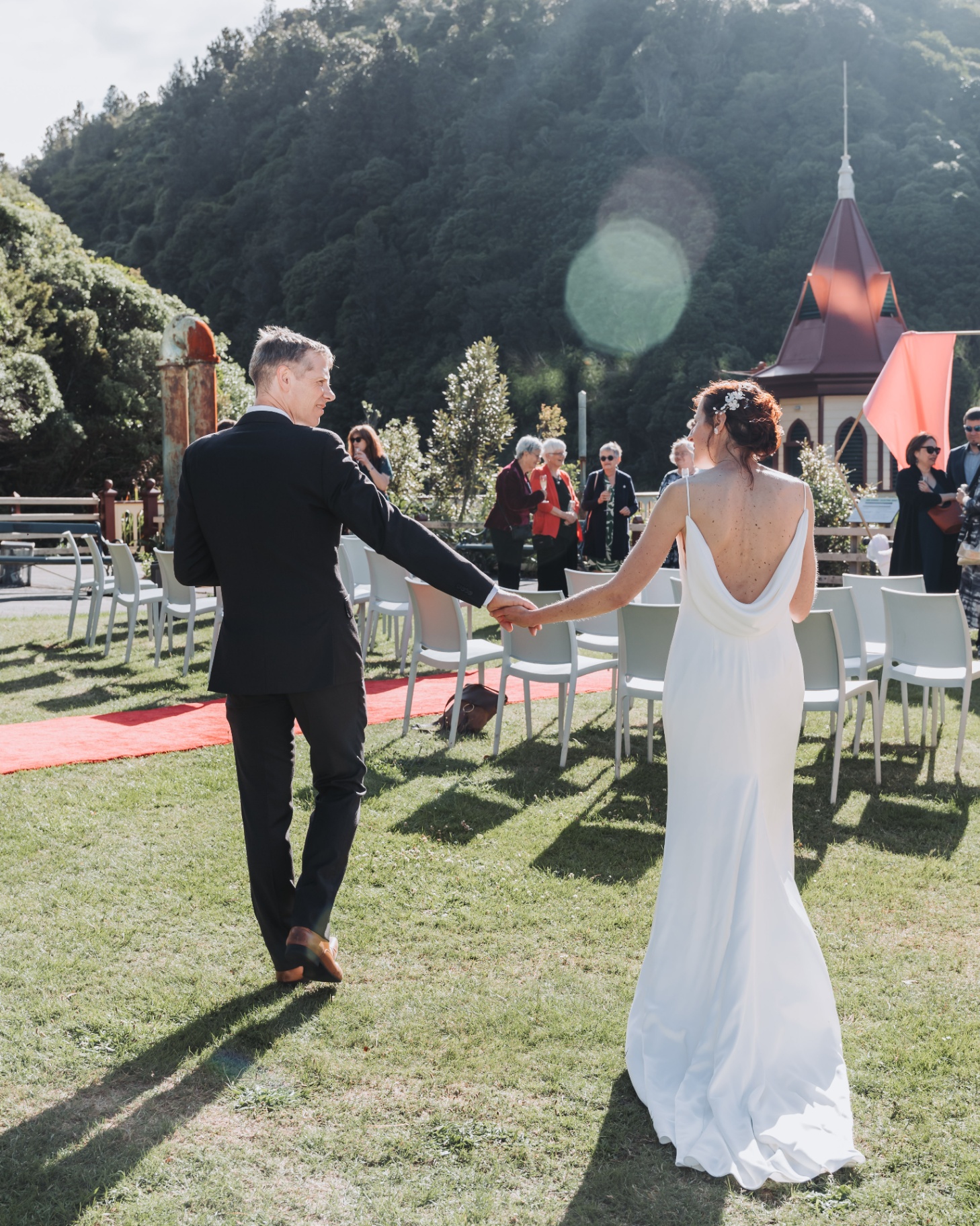 Gold Coast wedding photographer — bride and groom walking