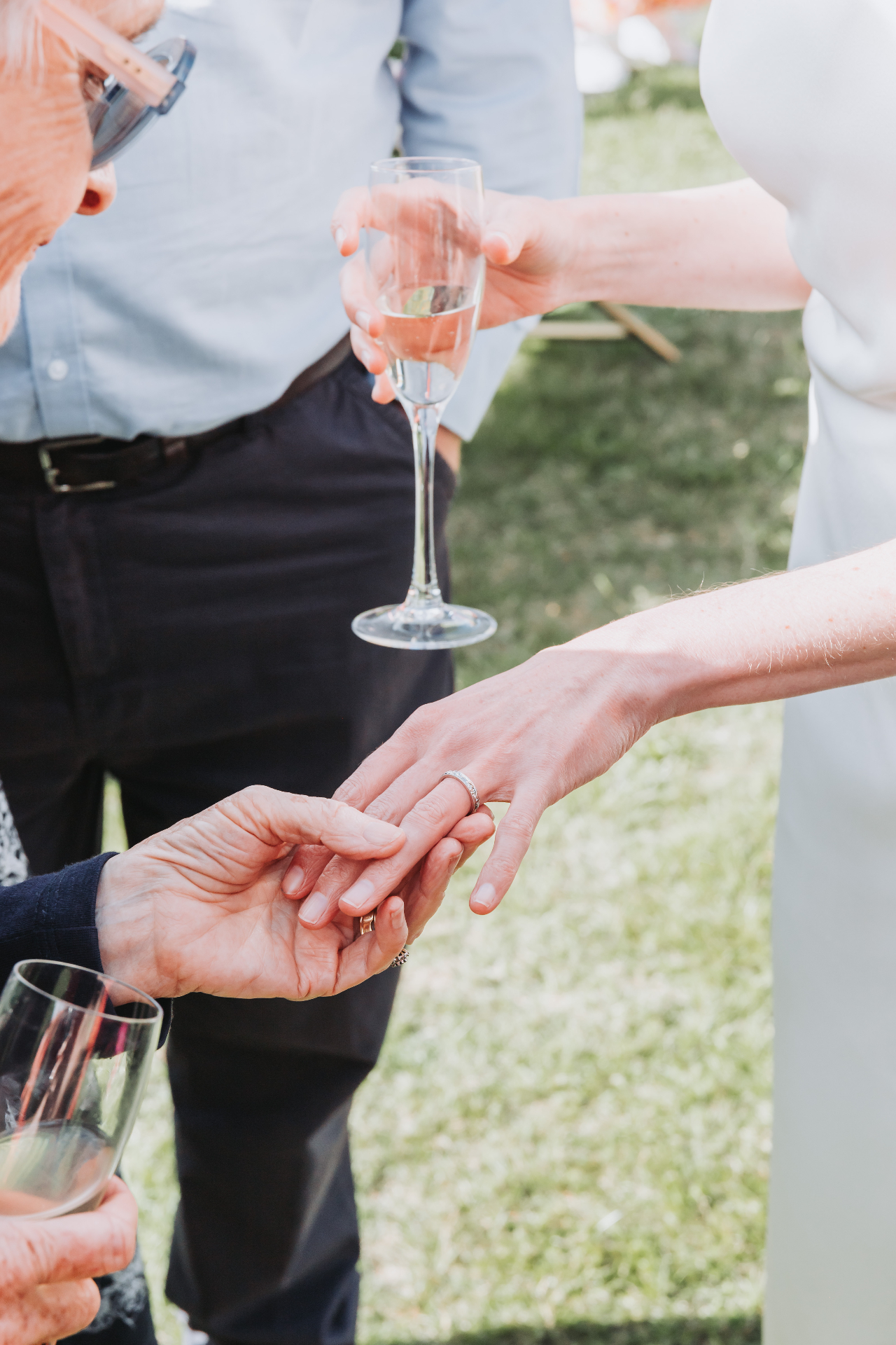 Luxury wedding photography — ring exchange close-up